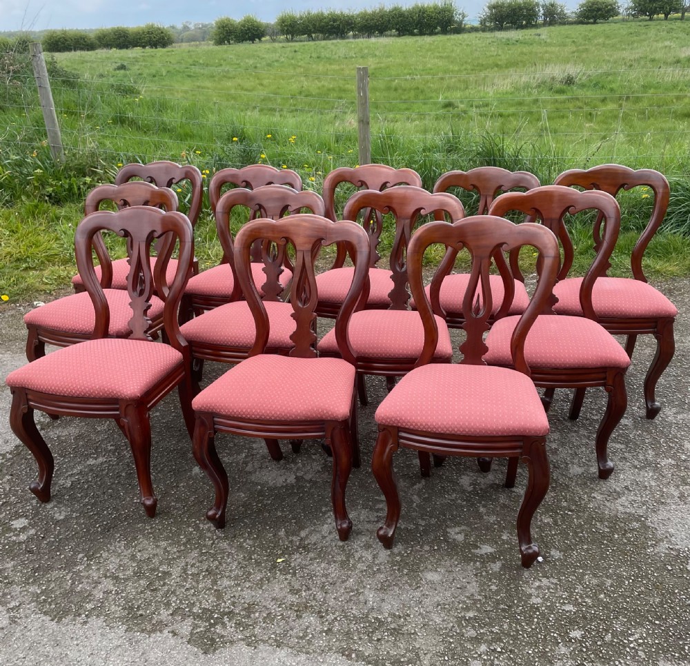 C19TH Set of 12 mahogany spear point balloon back dining chairs 