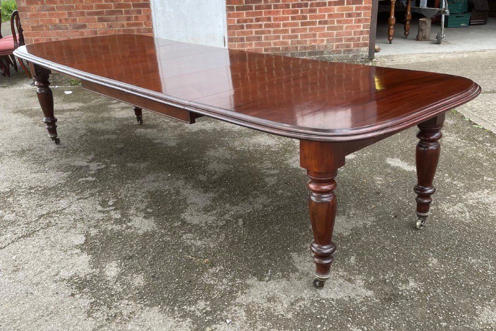 C19TH large solid mahogany 12 seater extending dining table View II