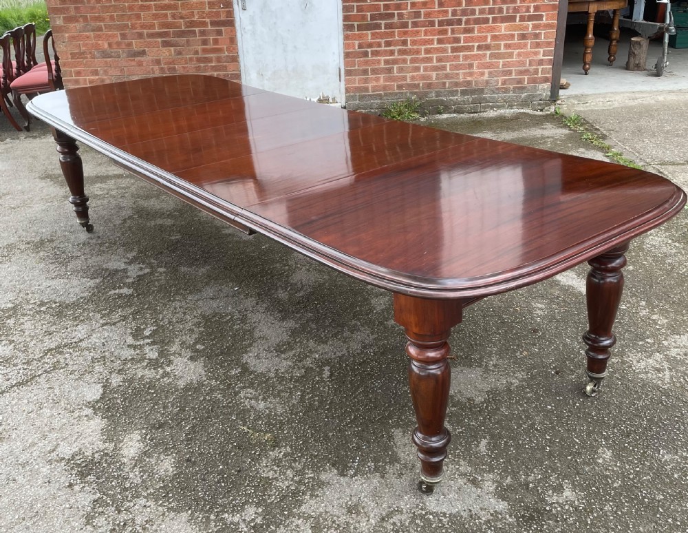 C19TH large solid mahogany 12 seater extending dining table View V