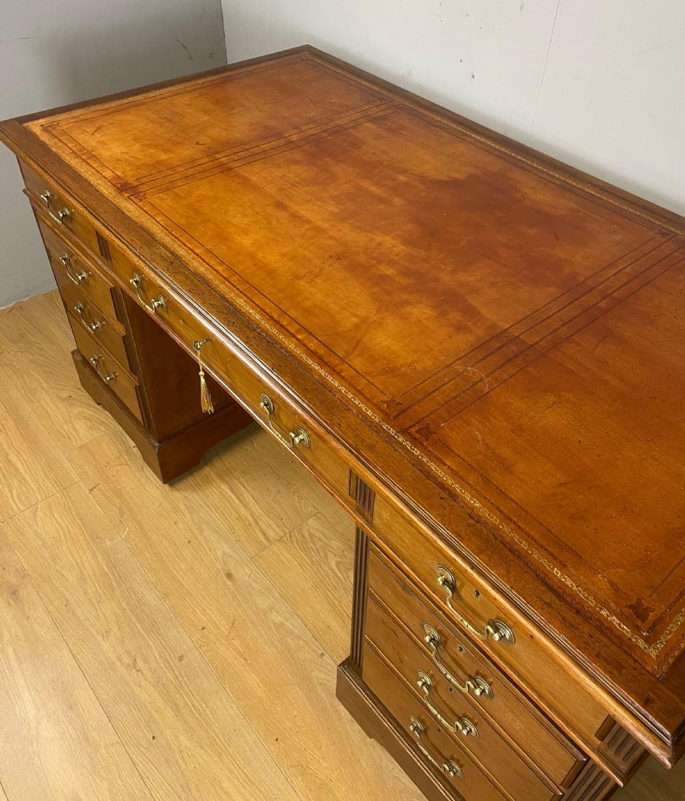 Edwardian twin pedestal mahogany desk with inset leather top  View V