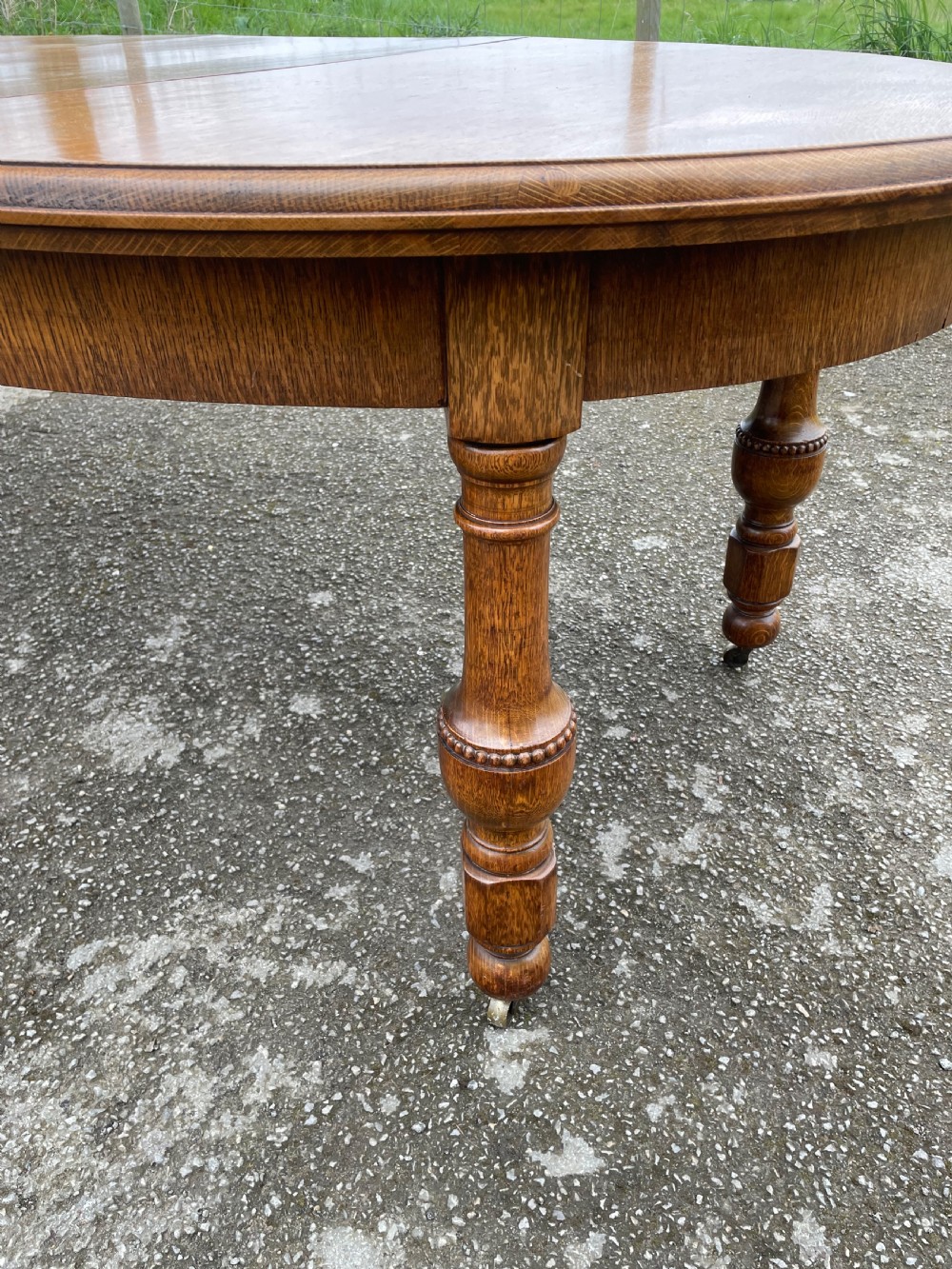 Large Arts and crafts golden oak wind out dining table  View III
