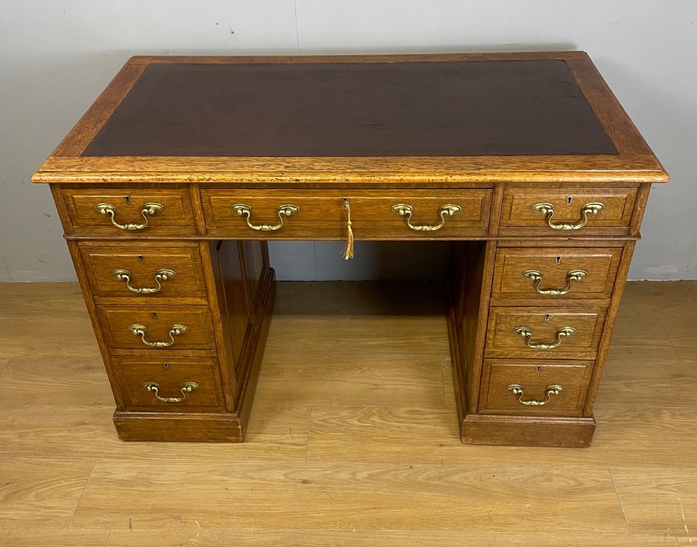 Edwardian solid oak twin pedestal desk with inset leather top  View II