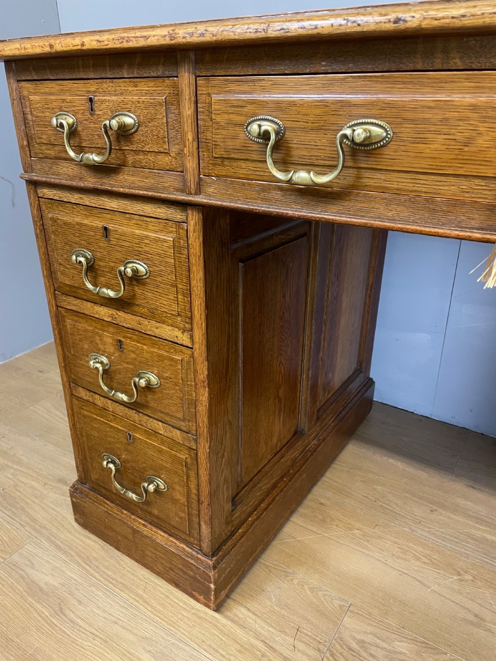 Edwardian solid oak twin pedestal desk with inset leather top  View V