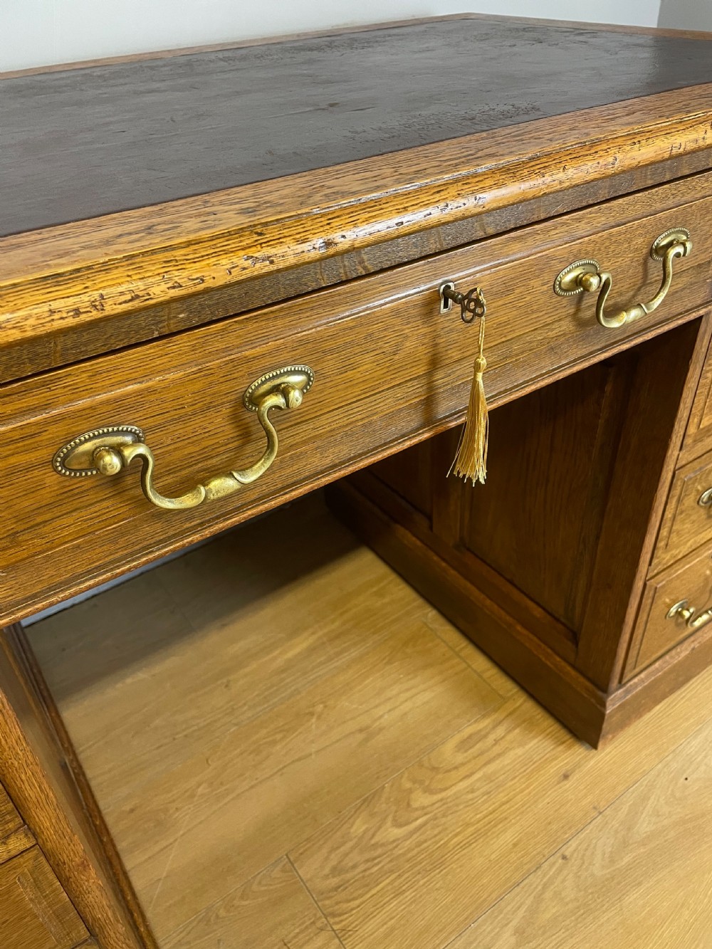 Edwardian solid oak twin pedestal desk with inset leather top  View VI