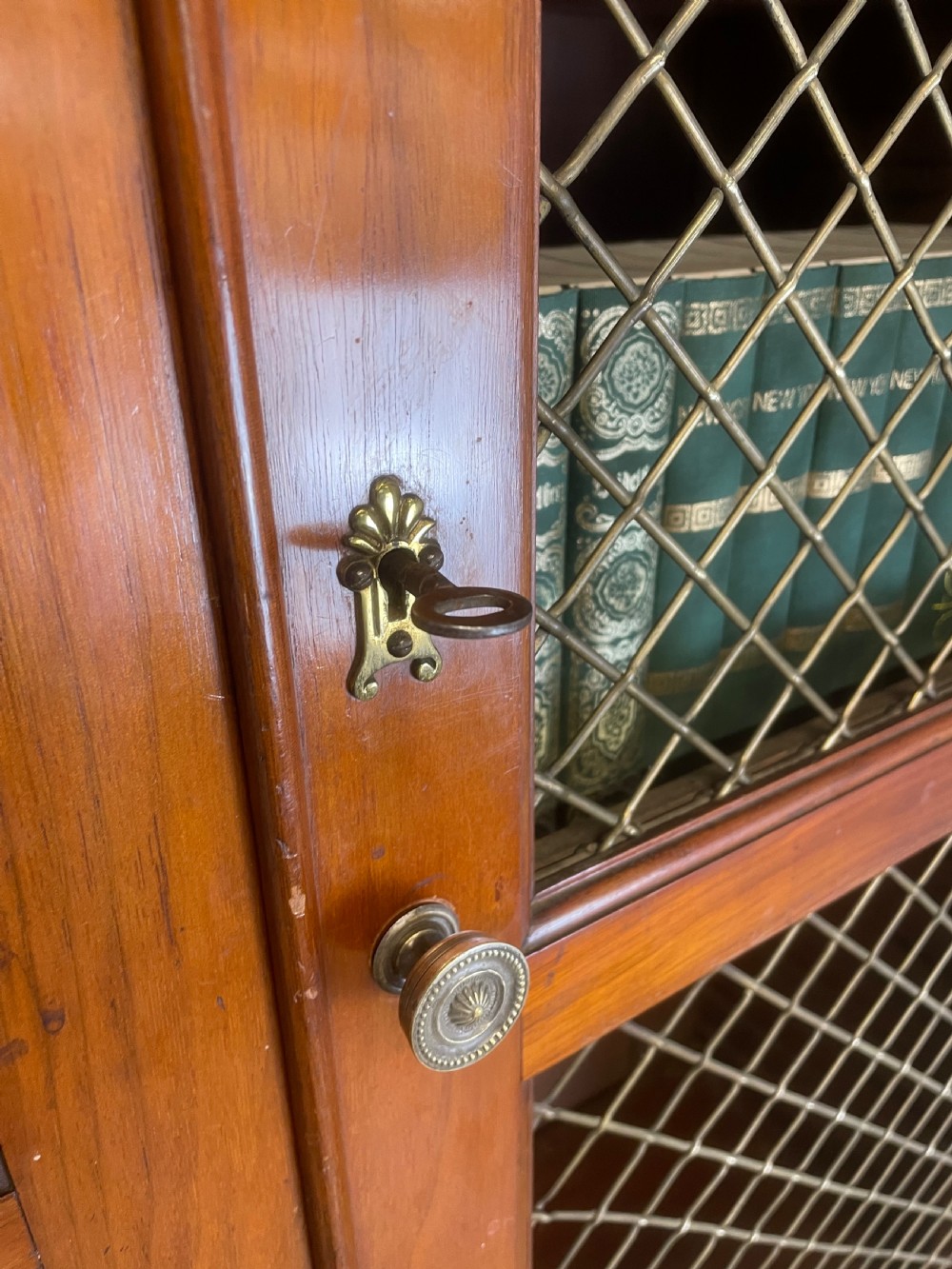 C19TH walnut two door country house bookcase with brass grilles View VI