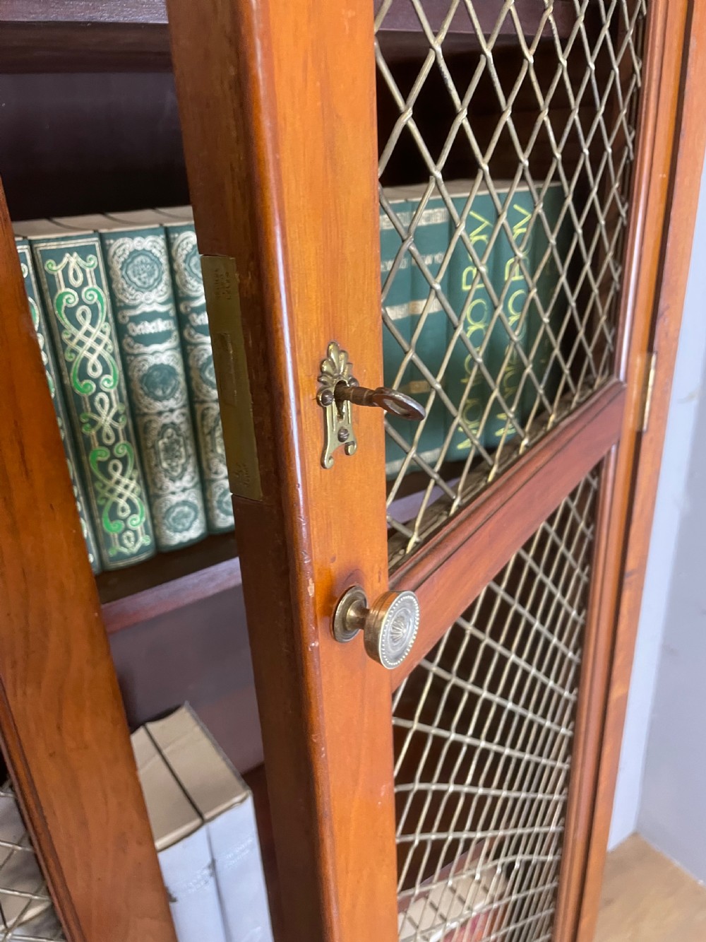 C19TH walnut two door country house bookcase with brass grilles View VII