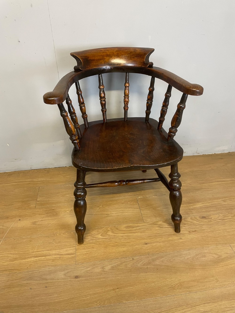 C19TH ash and elm smokers bow Windsor chair 