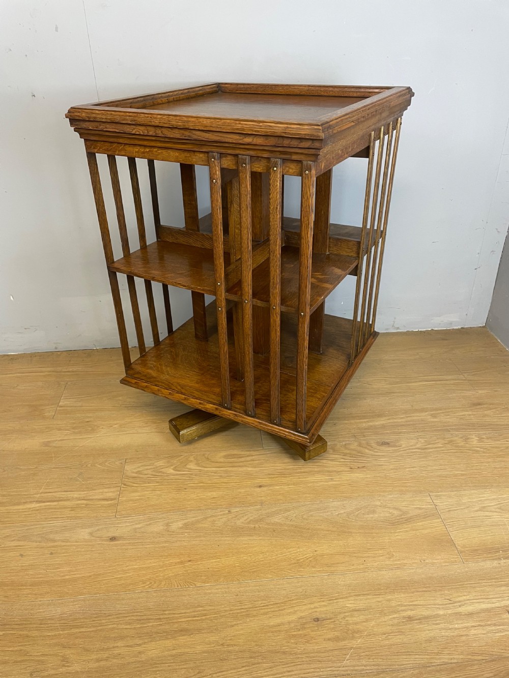 Arts and Crafts solid oak rotating bookcase 