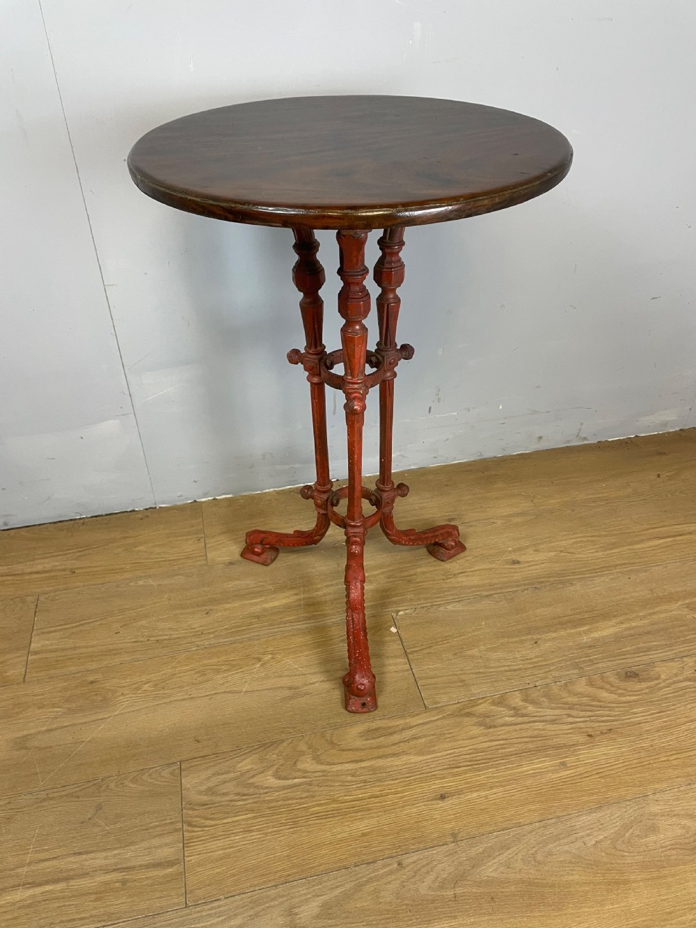 C19TH cast iron table with original mahogany top 