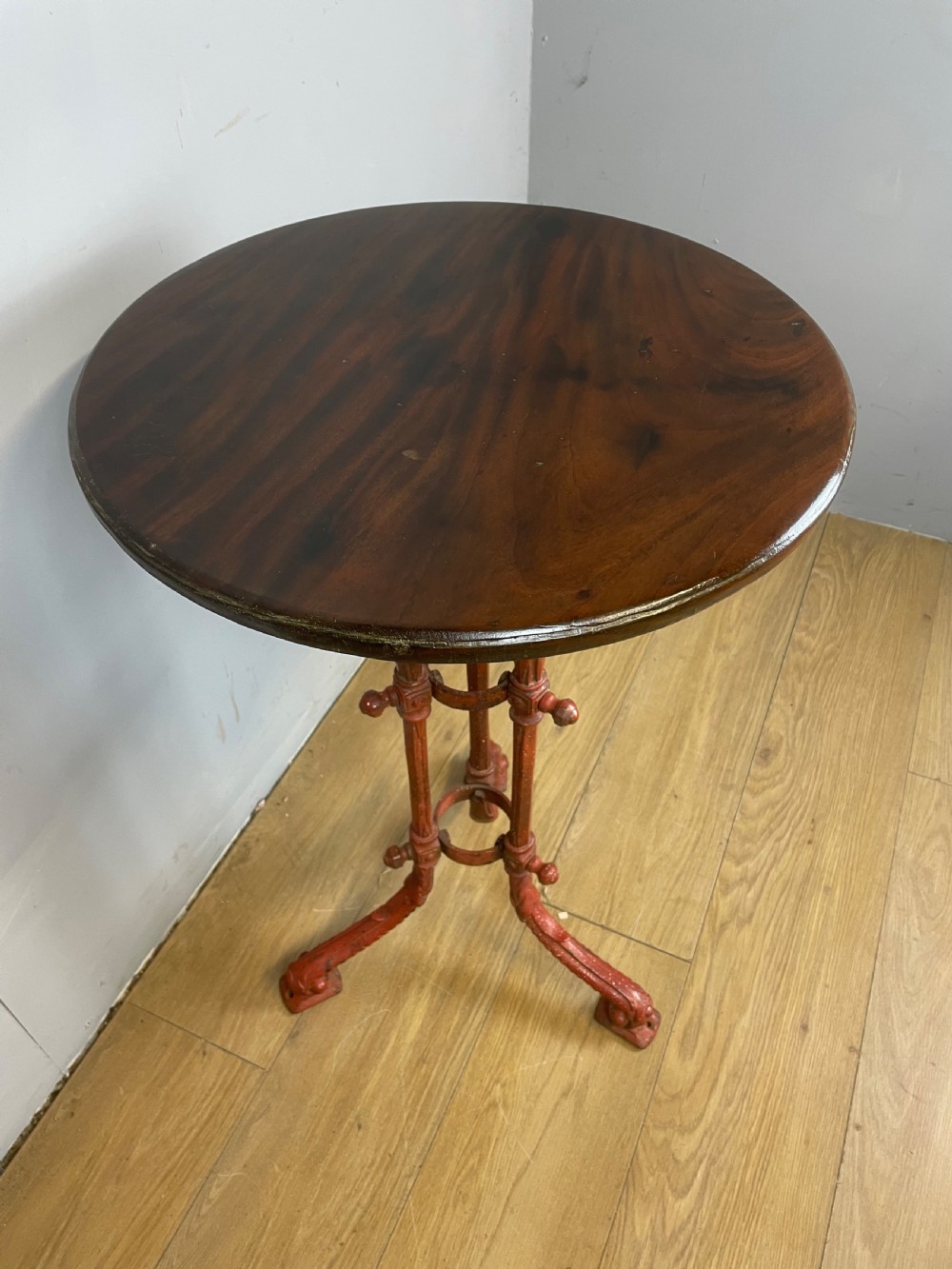 C19TH cast iron table with original mahogany top  View V