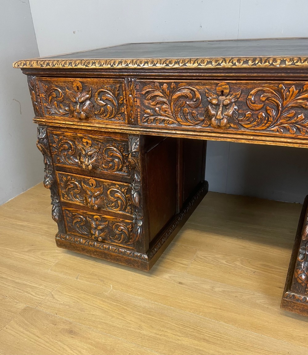 C19TH carved oak twin pedestal desk  View II