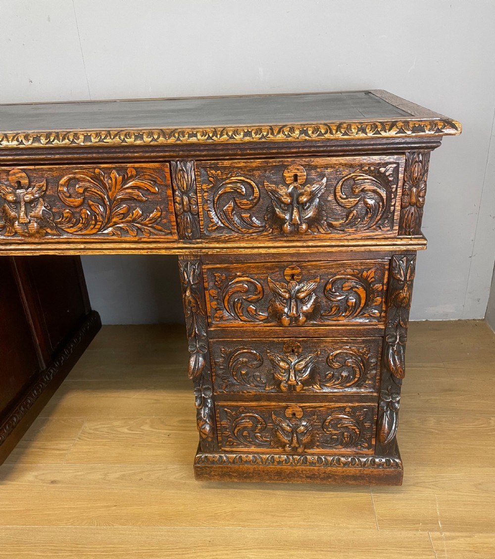 C19TH carved oak twin pedestal desk  View IV