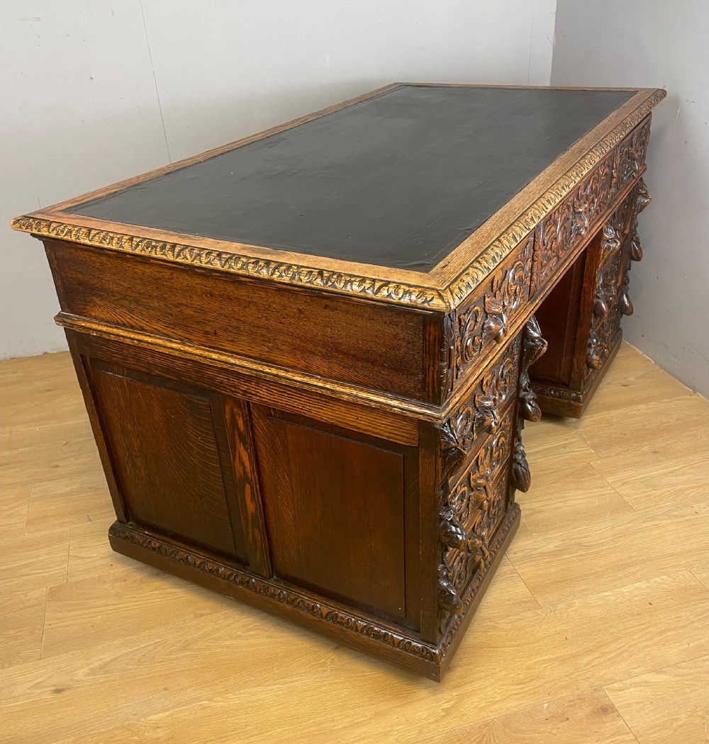 C19TH carved oak twin pedestal desk  View VIII