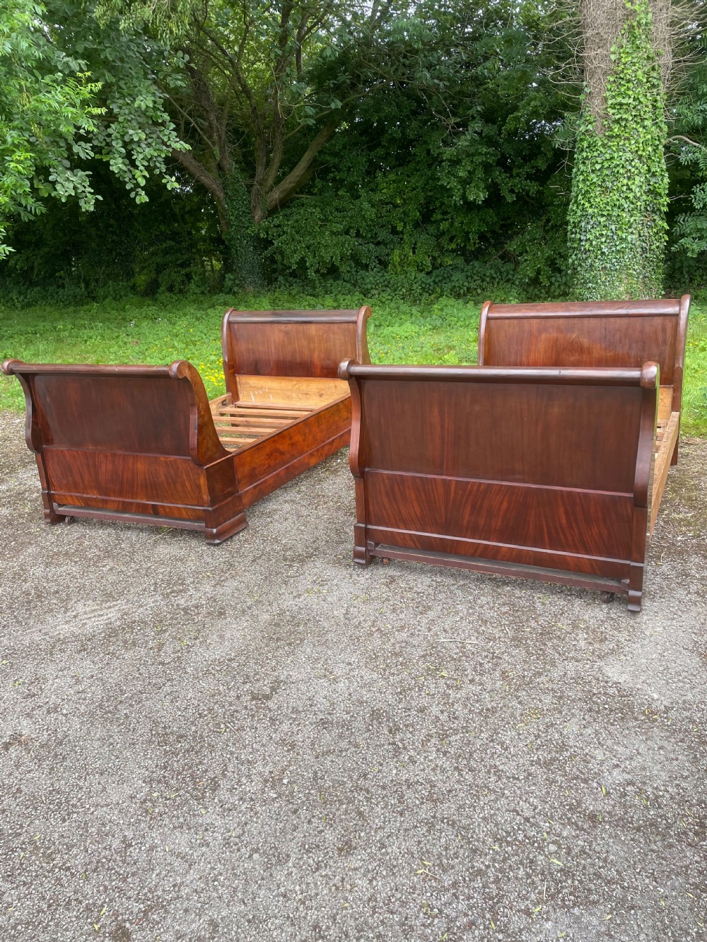 Pair of C19TH French mahogany bateau lit beds 