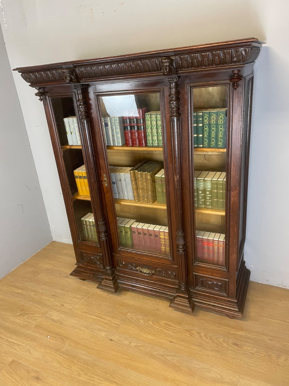 C19TH carved freestanding glazed walnut bookcase  View III