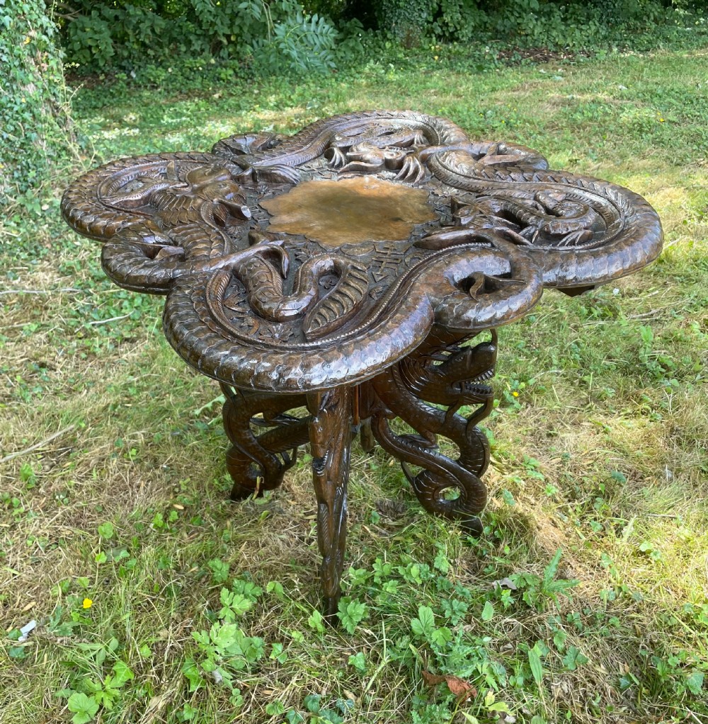 Late C19TH carved Burmese dragon table  View IV