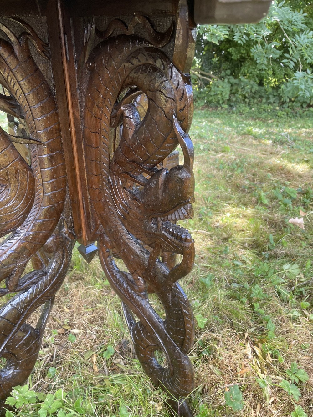 Late C19TH carved Burmese dragon table  View VI