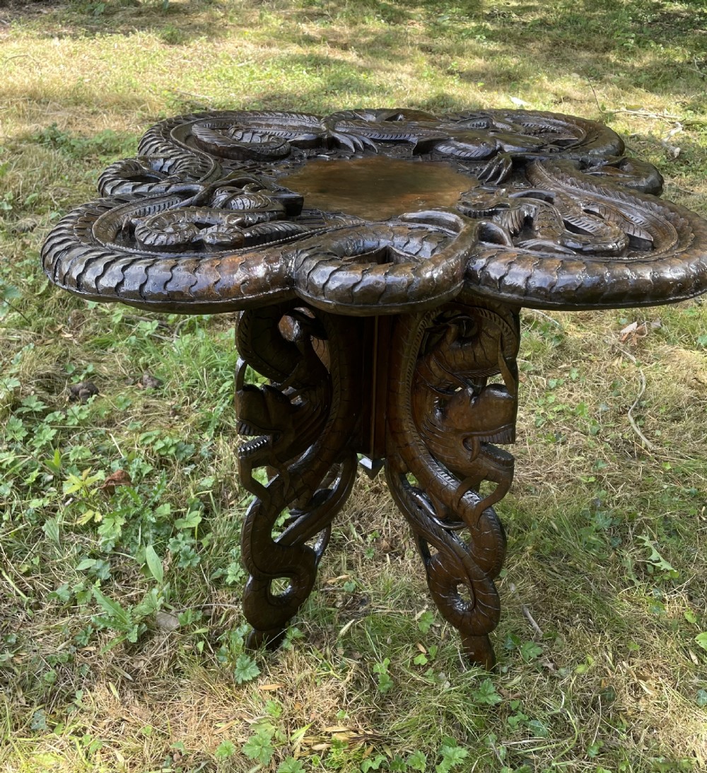 Late C19TH carved Burmese dragon table  View IX