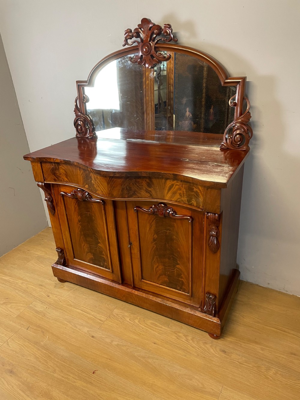 C19TH flame mahogany chiffonier  View II