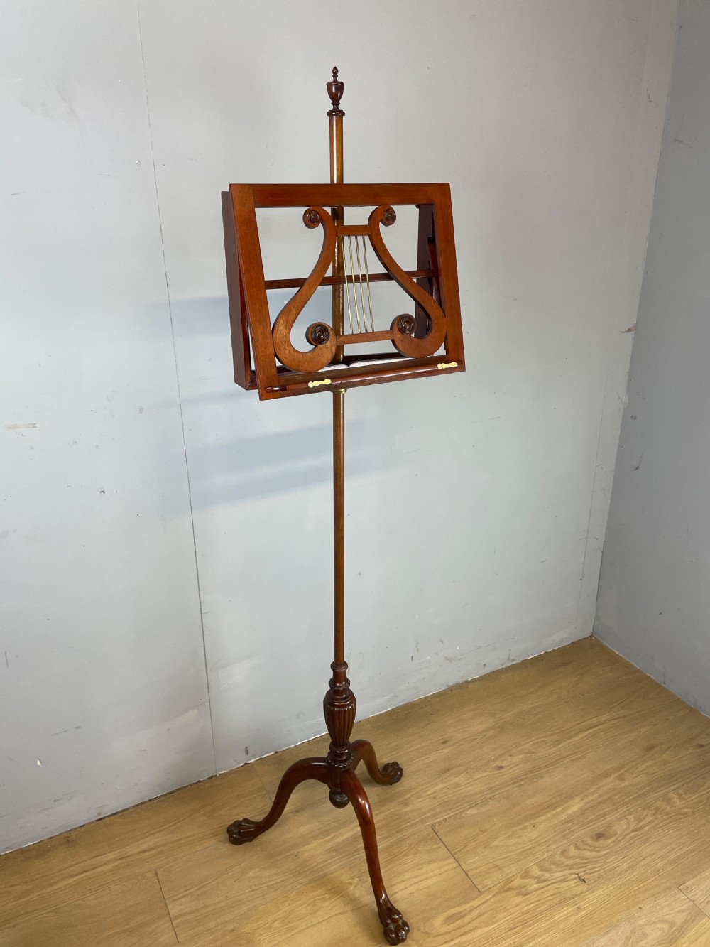 Late C19TH mahogany music stand on a tripod base  View II