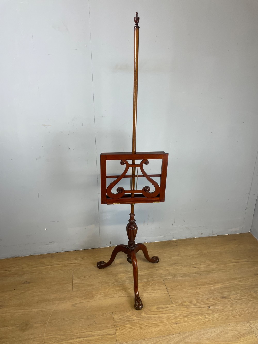 Late C19TH mahogany music stand on a tripod base  View XI