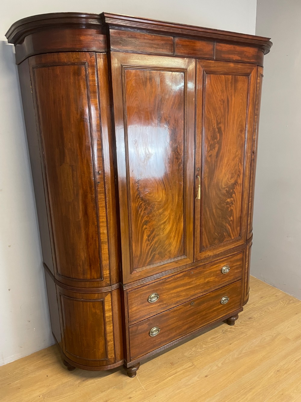 C19TH country house flame mahogany bow fronted and breakfront wardrobe  View III
