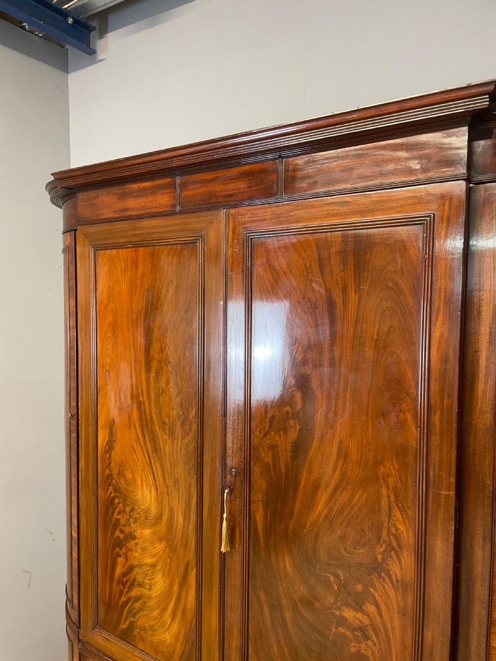 C19TH country house flame mahogany bow fronted and breakfront wardrobe  View V