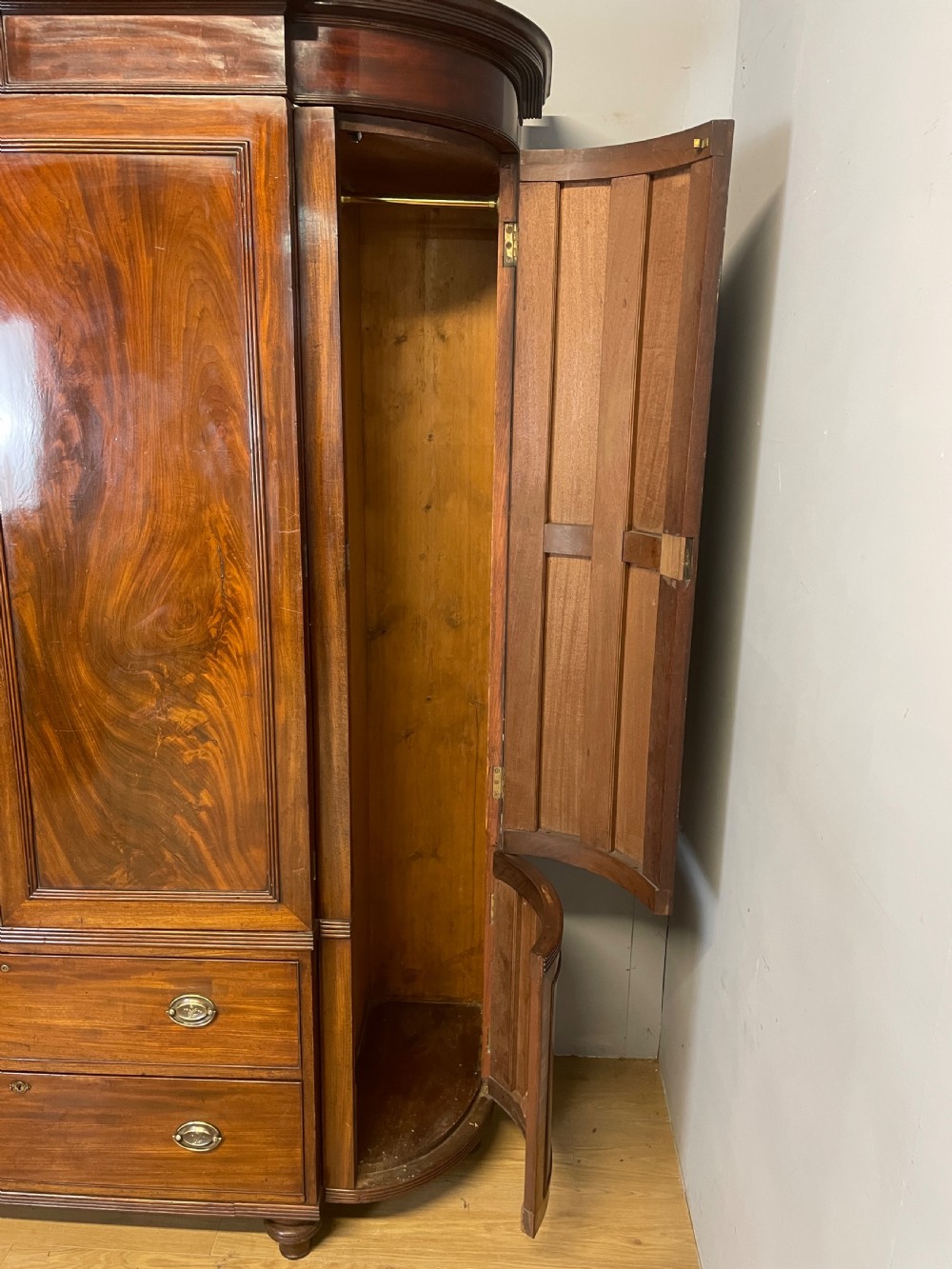 C19TH country house flame mahogany bow fronted and breakfront wardrobe  View XIV