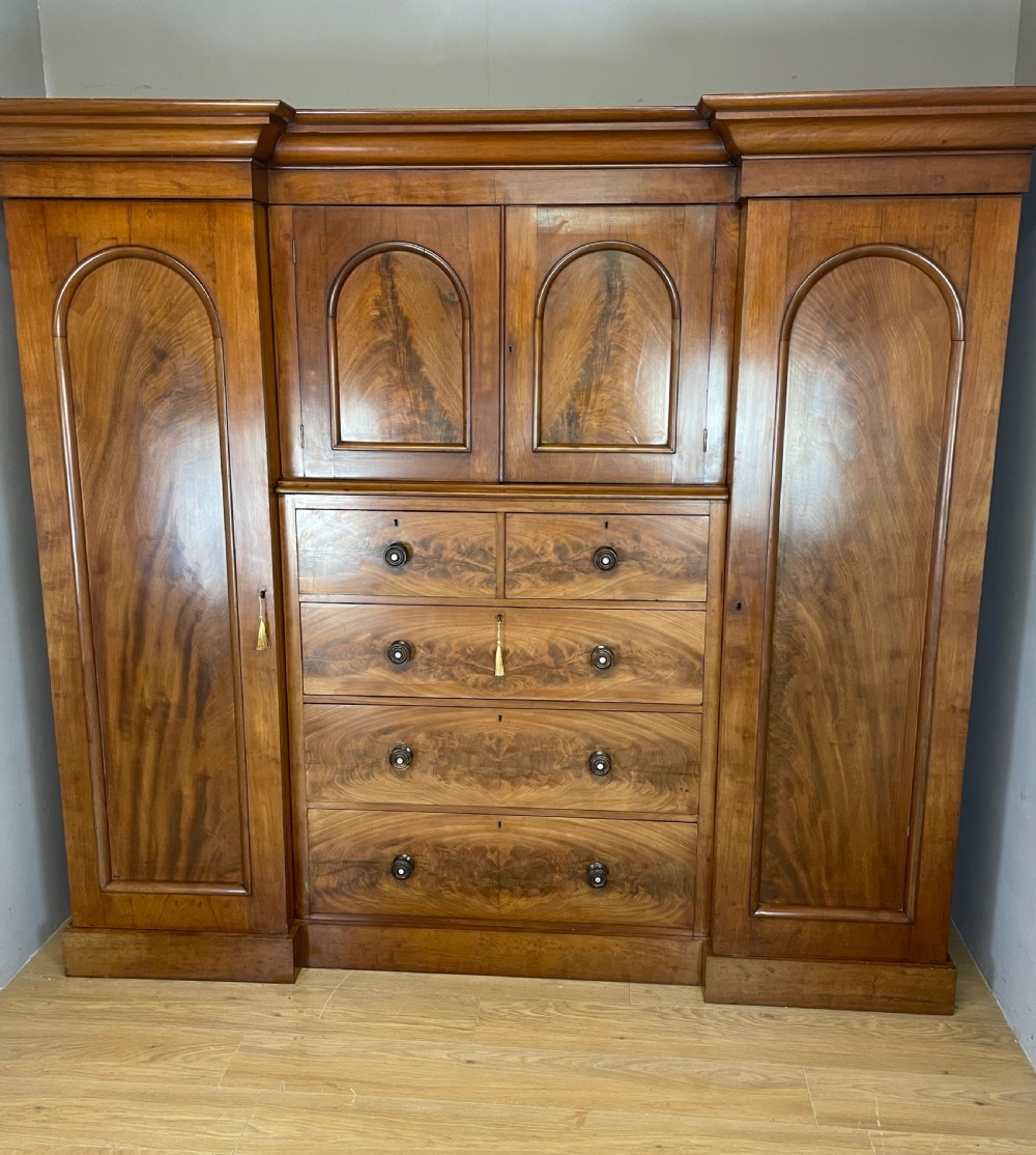 C19TH country house flame mahogany four door wardrobe  View II