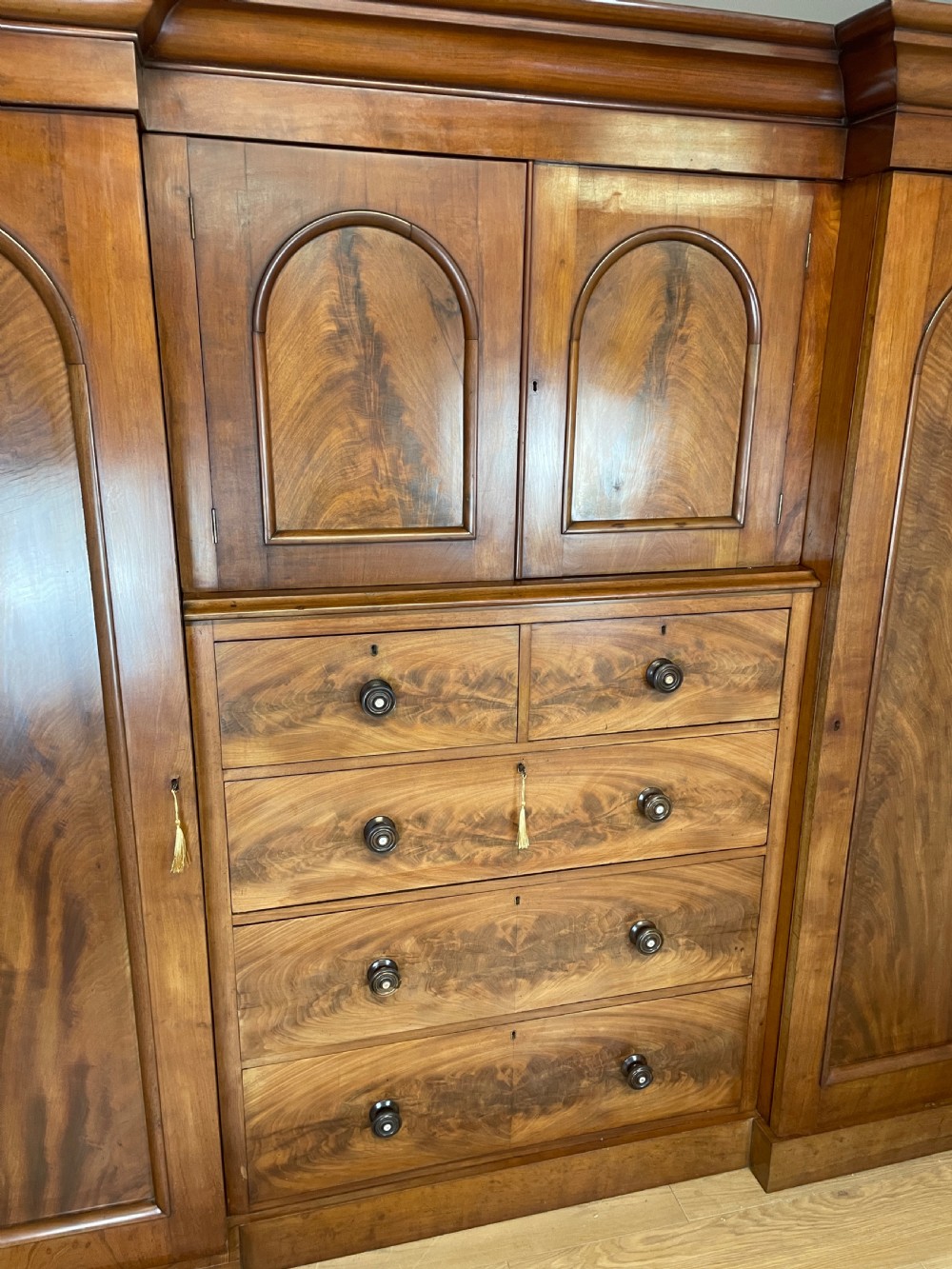 C19TH country house flame mahogany four door wardrobe  View IV