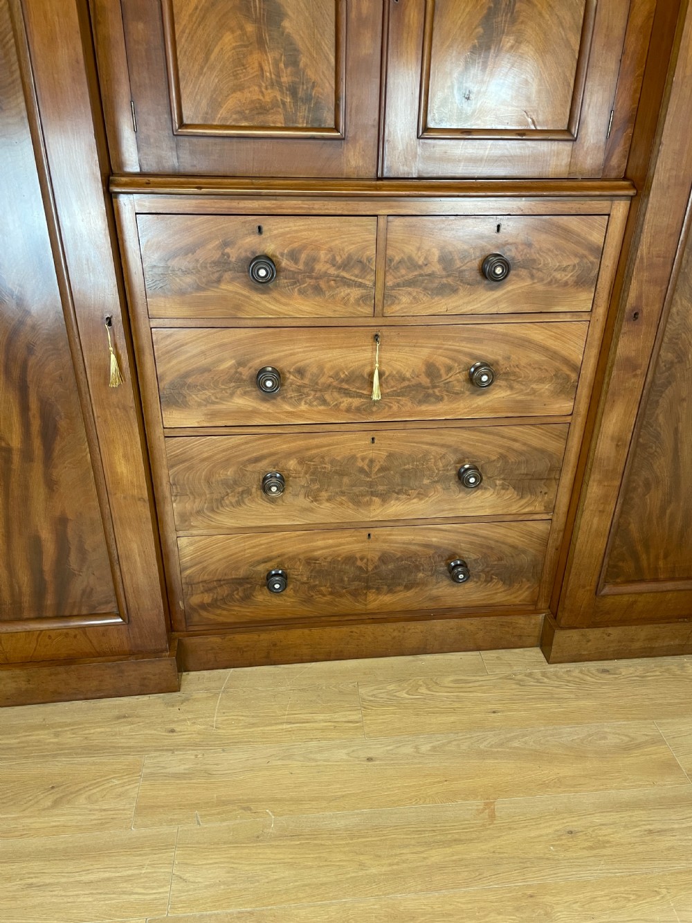 C19TH country house flame mahogany four door wardrobe  View VI