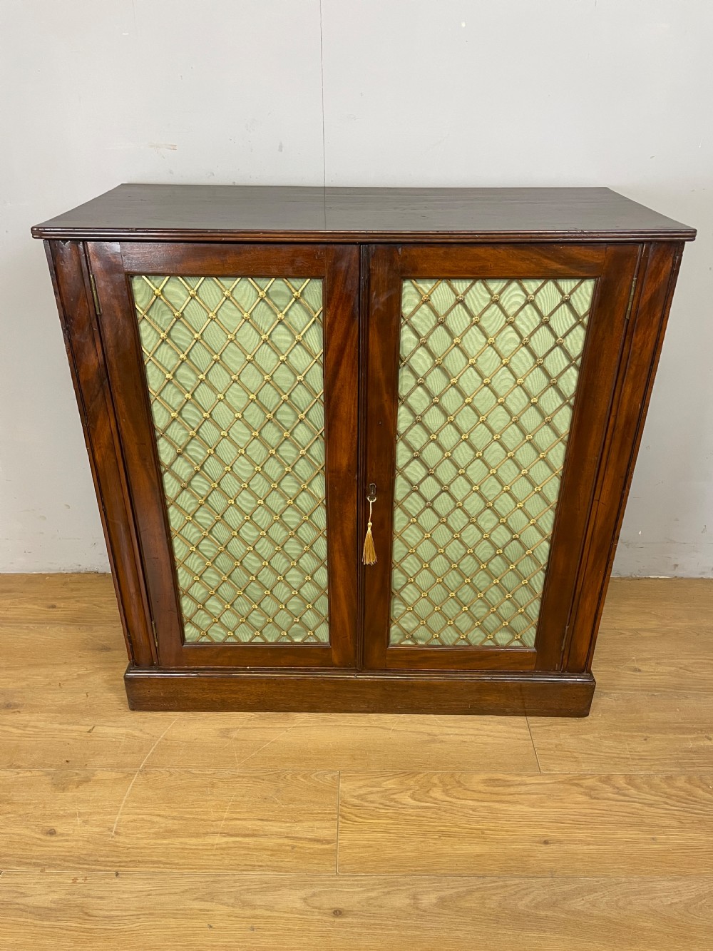 Late Regency mahogany two door side cabinet  View II