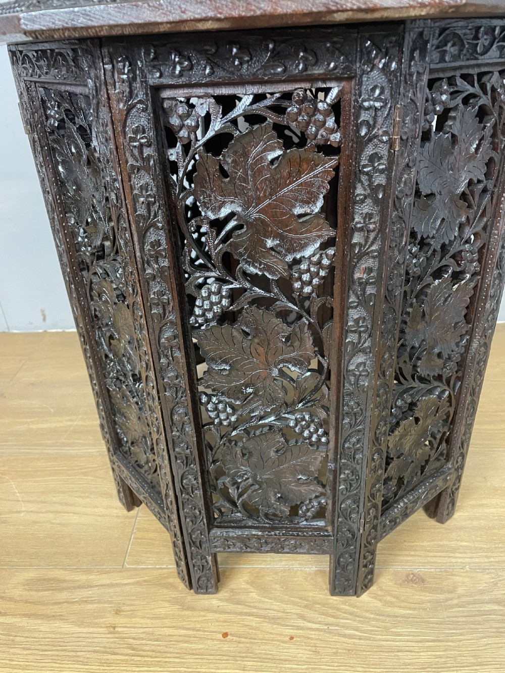 Carved Anglo Indian folding octagonal table  View II