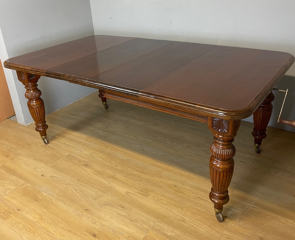 C19TH solid walnut wind out dining table  View II