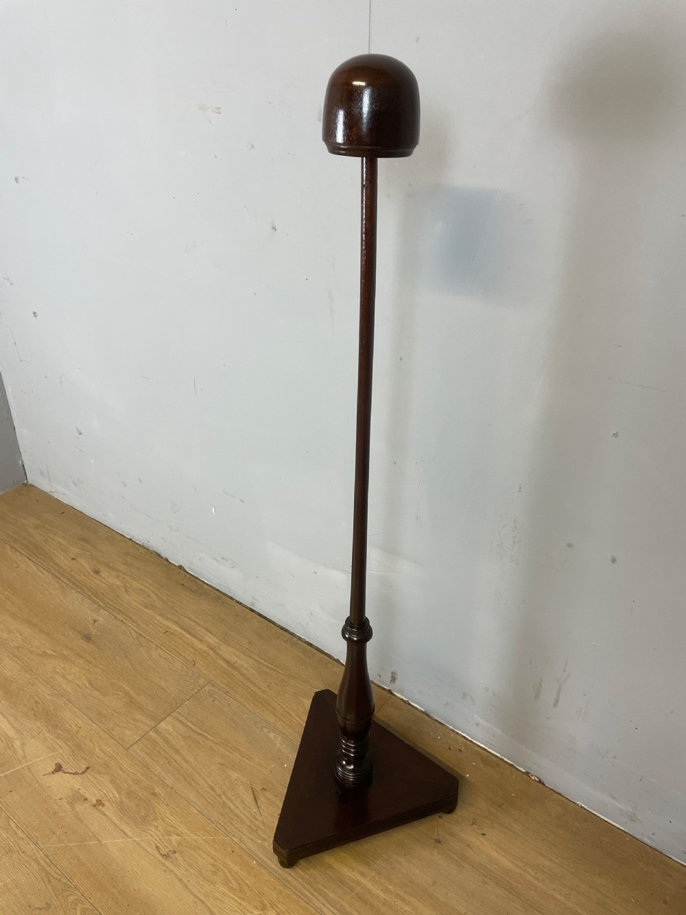 Regency mahogany wig stand on tripartite base  View III