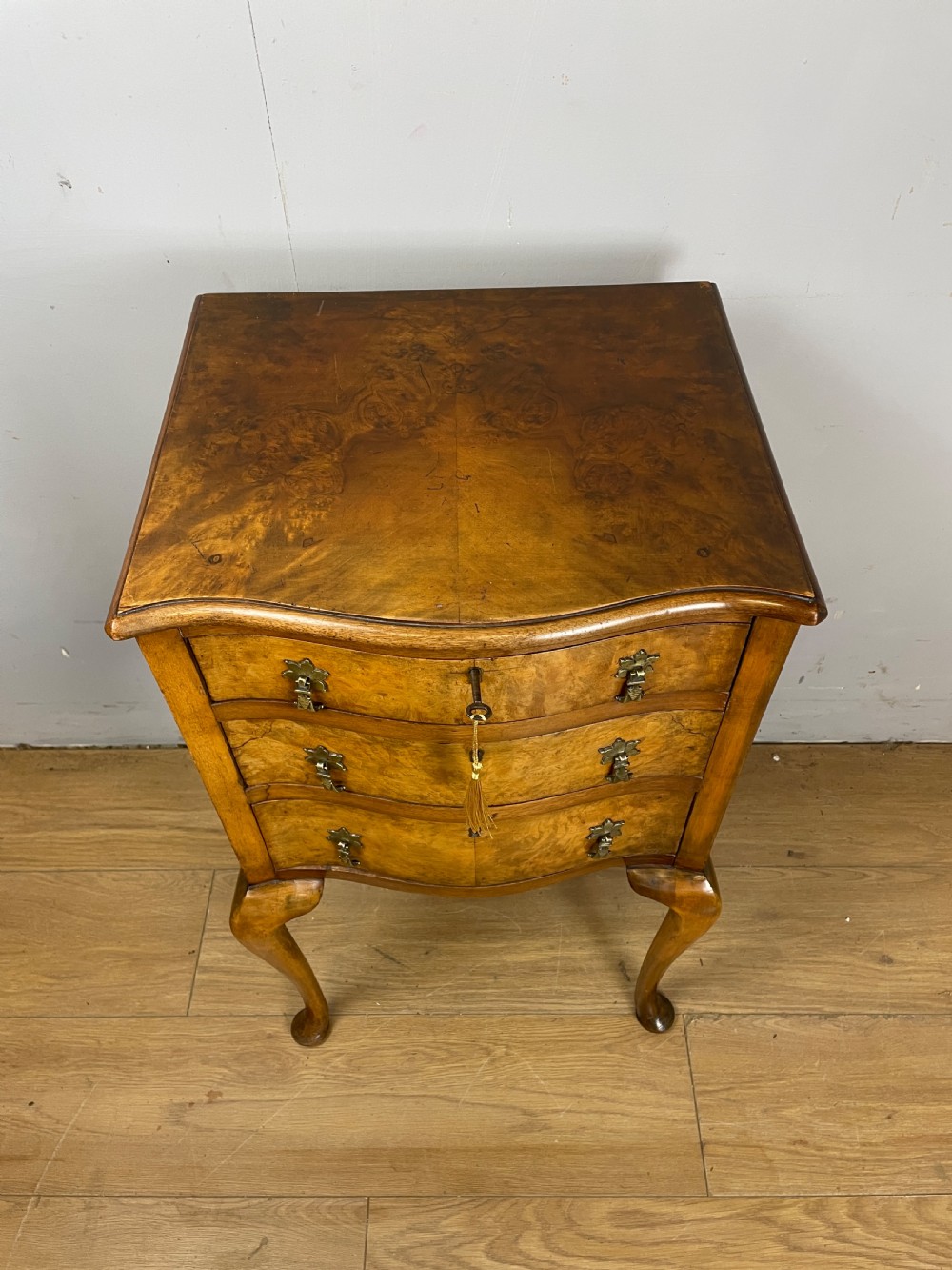 Burr walnut serpentine fronted three height chest of drawers  View III