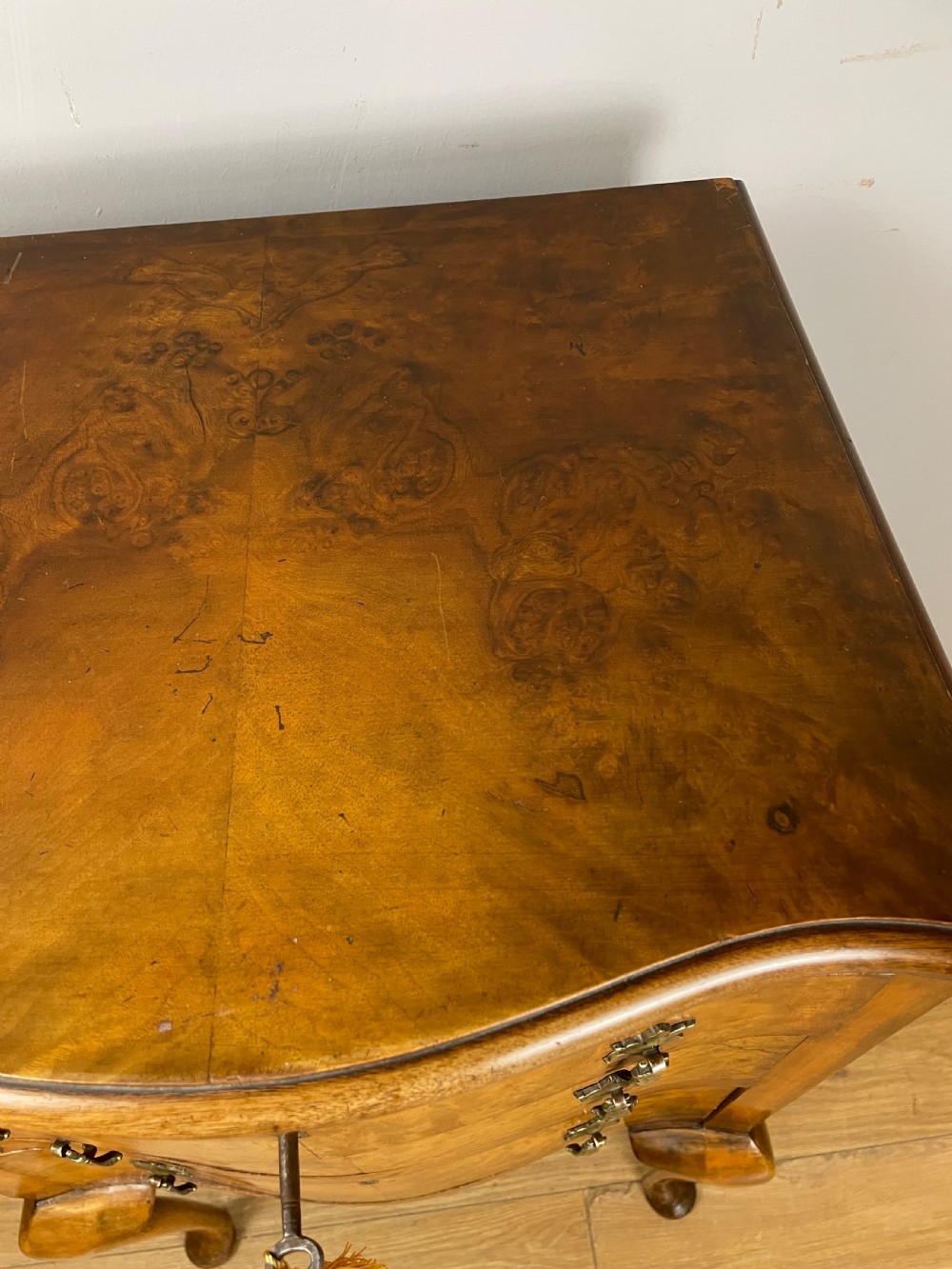 Burr walnut serpentine fronted three height chest of drawers  View XII