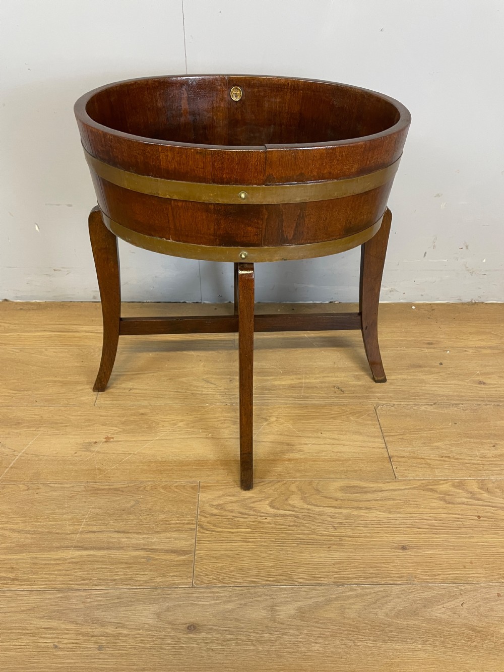 Edwardian oak jardiniere by RA Lister and Co