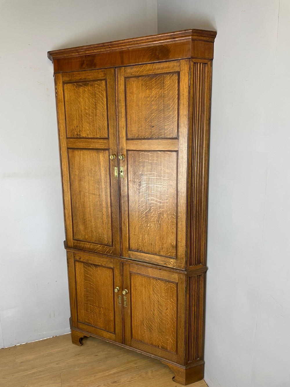 Georgian freestanding golden  oak corner cupboard 