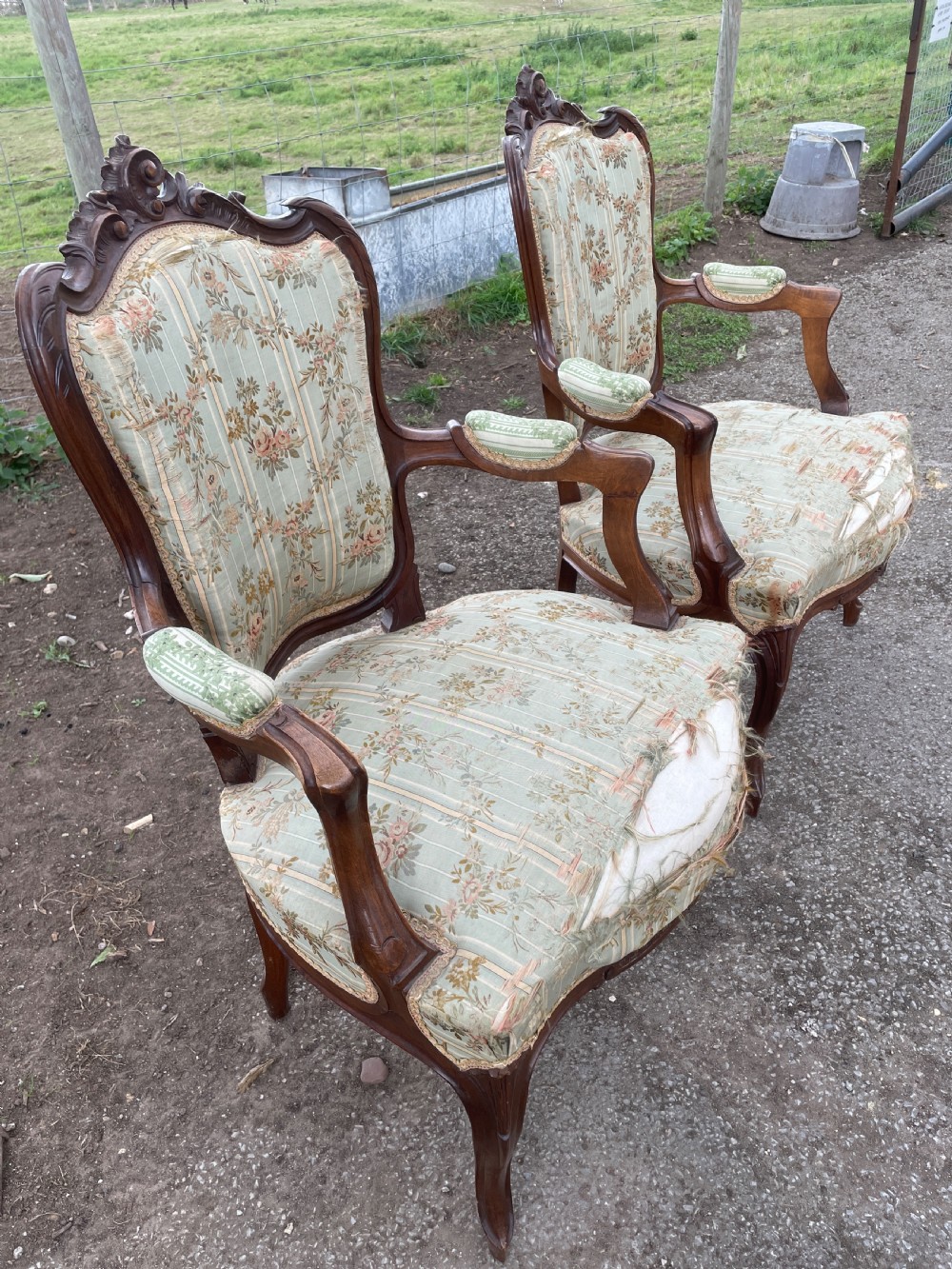 Pair of French Louis XV style Fauteuils chairs in worn country house condition  View V