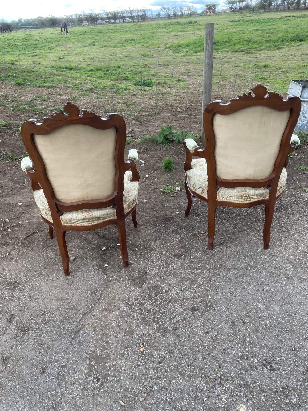 Pair of French Louis XV style Fauteuils chairs in worn country house condition  View IX