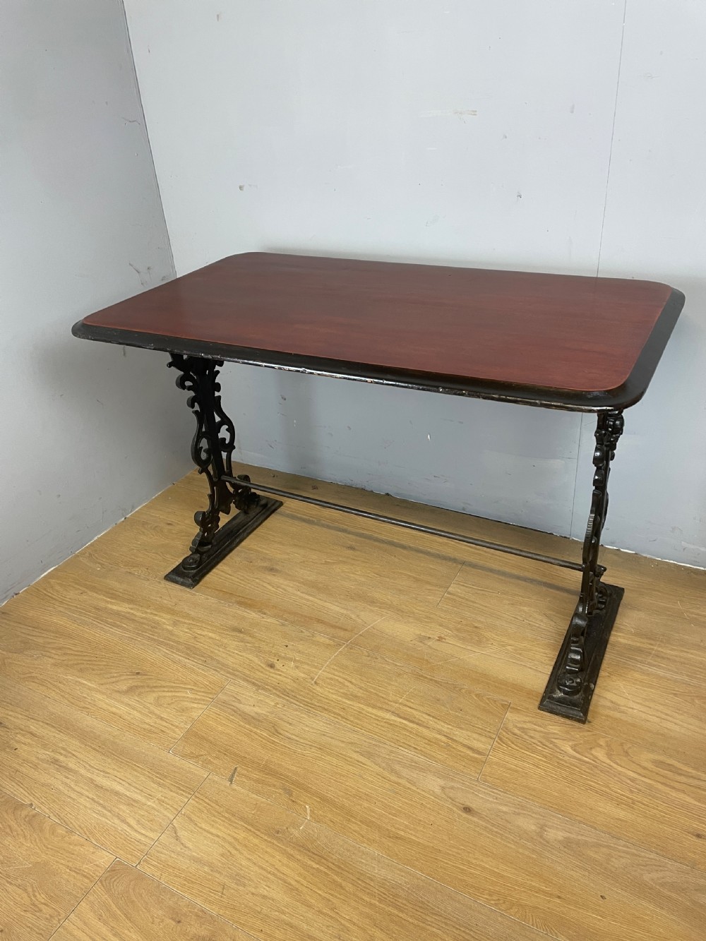 Victorian cast iron pub table with mahogany top  View II