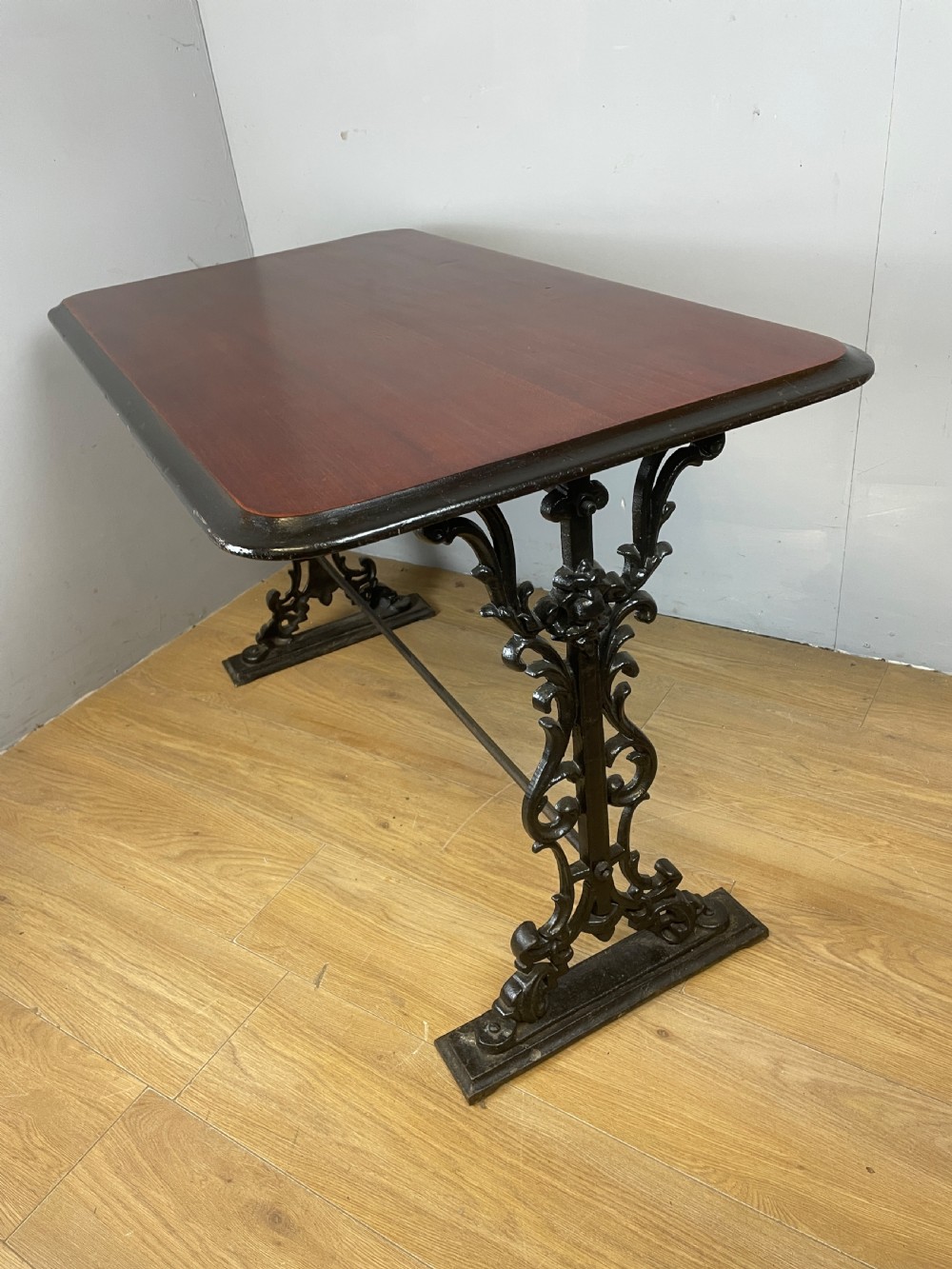Victorian cast iron pub table with mahogany top  View IV