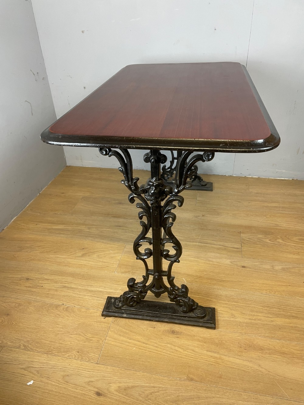 Victorian cast iron pub table with mahogany top  View IX