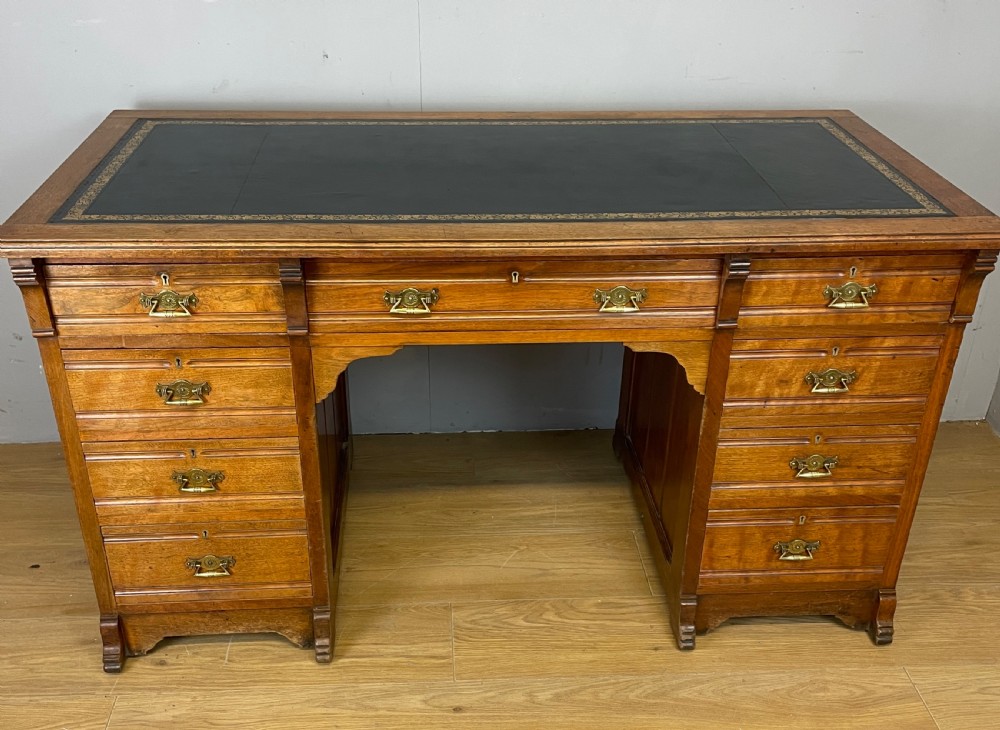 C19TH walnut desk with tooled  inset leather top