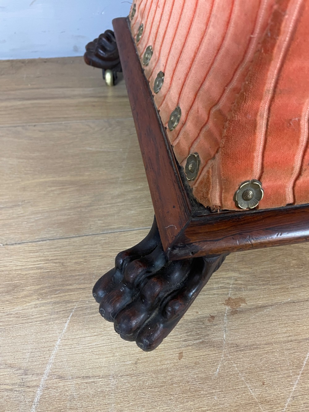 Late Regency sarcophagus shaped ottoman on carved feet  View V