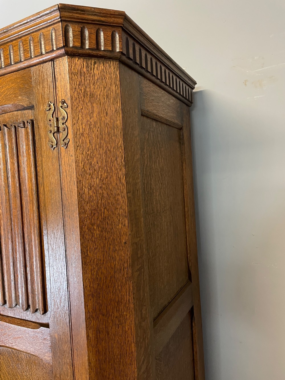 Early C20th linen fold oak hall cupboard  View V