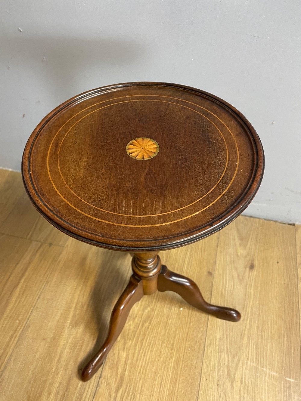 Inlaid mahogany tripod wine table circa 1920 View V