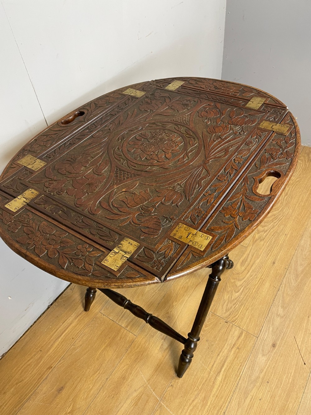 Arts and crafts carved walnut butlers tray on stand  View II