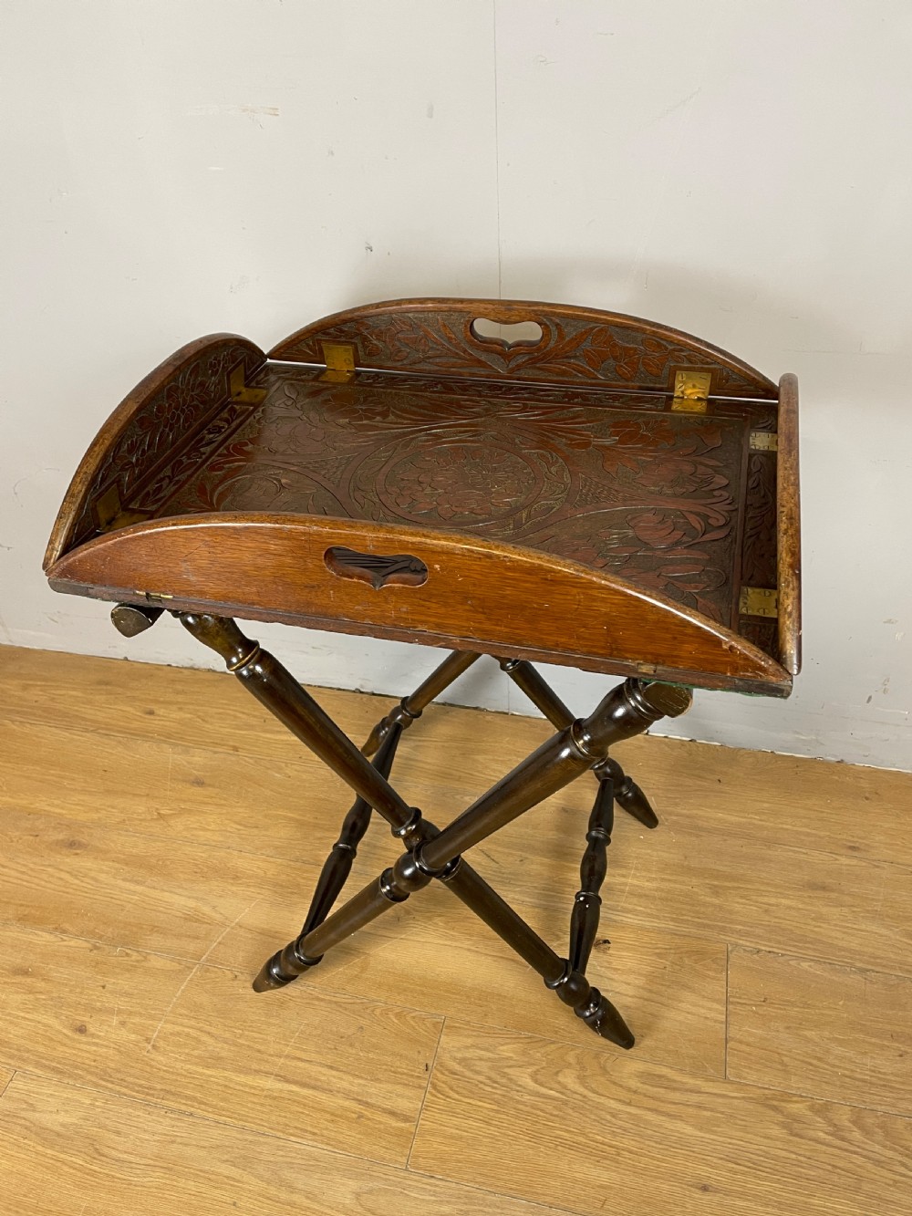 Arts and crafts carved walnut butlers tray on stand  View III